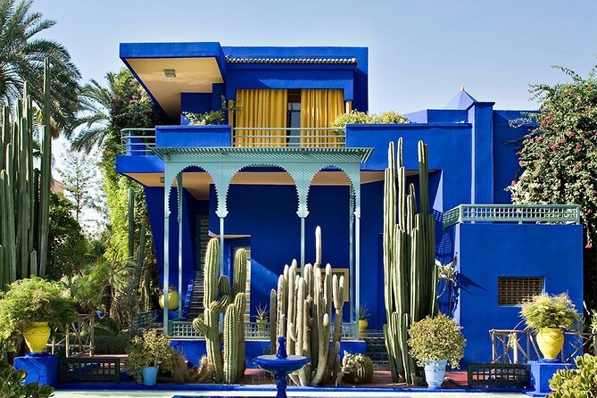 Cobalt-blue villa and cactus garden inside Jardin Majorelle, Marrakech